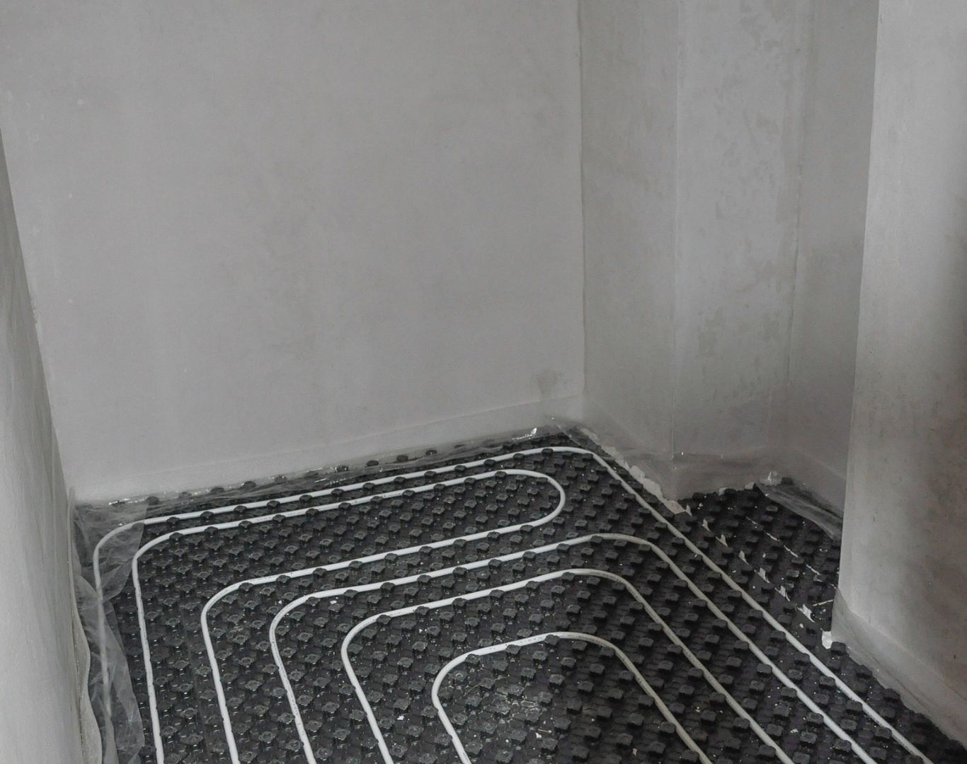 Geothermal Heating and Cooling in Voorhees - NJ underway as a technician checks indoor system controls